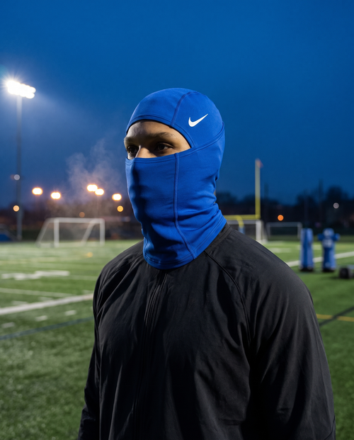 Nike Pro Football Hood in blue worn during cold-weather football training