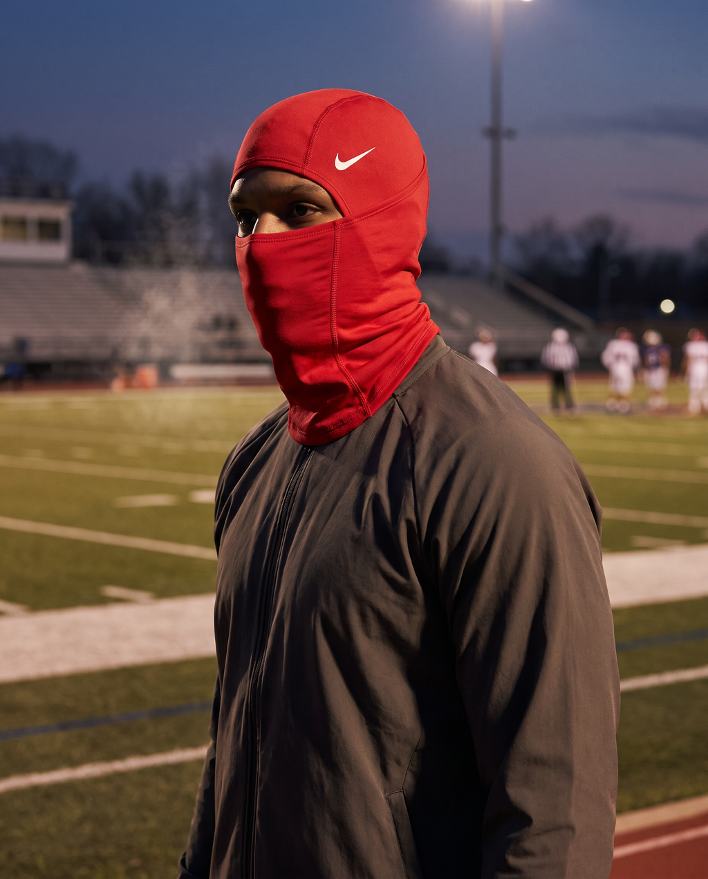 Nike Pro Football Hood in red worn during cold-weather football training